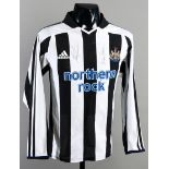 A Newcastle United replica jersey signed by club legends Sir Bobby Robson and Alan Shearer,