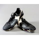 Dennis Bergkamp: a pair of signed match-worn Reebok football boots circa 1994,
black & white,