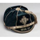 A blue Northern Ireland international cap awarded to Norman Kernaghan in season 1936-37,