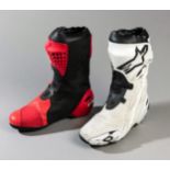 2012 Jorge Lorenzo MotoGP race boots by Alpinestars,
the right one in orange with white logo,