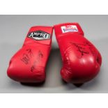 Boxing gloves signed by Anthony Joshua and Kevin Mitchell,