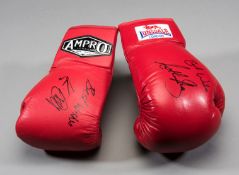 Boxing gloves signed by Anthony Joshua and Kevin Mitchell,
