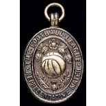 A silver-gilt Football League representative medal awarded to Peter Osgood for the match v The