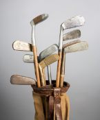 Ten hickory shafted putters,
including an Otey Crisman brass faced Stylist H.B.