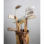 Ten hickory shafted putters,
including an Otey Crisman brass faced Stylist H.B.