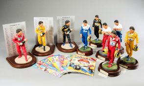 Nine Ayrton Senna figurines by Endurance and ten Senninha comics,