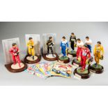 Nine Ayrton Senna figurines by Endurance and ten Senninha comics,