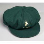 A green South Africa cricket cap awarded to Graeme Pollock during the country's international