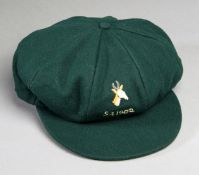 A green South Africa cricket cap awarded to Graeme Pollock during the country's international