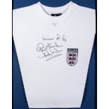 A white replica England football shirt signed by the 1966 World Cup winner Ray Wilson,