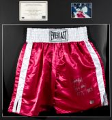 A Larry Holmes signed pair of boxing trunks,