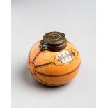 A Victorian gentlemen's ceramic inkwell modelled and decorated as a leather panelled rugby ball,