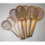 A group of seven vintage tennis racquets,