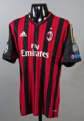 Mario Balotelli: a red & black striped AC Milan No.