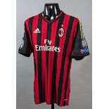 Mario Balotelli: a red & black striped AC Milan No.