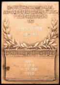 An International Amateur Athletic Federation World Record Holder plaque presented to Sebastian Coe