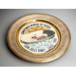 A 1962 World Cup souvenir dish,
the brass dish inscribed CAMPEONATO MUNDIAL DE FUTBOL, CHILE 1962,