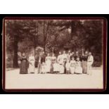 A French family group holiday photograph taken on a tennis court at Vernet-les-Bains in August 1892,