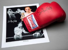 A Sir Henry Cooper signed boxing glove,