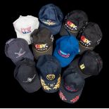 Eleven international motorsport and TV station caps,