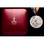 A Moscow 1980 Olympic Games silver second-place prize medal awarded for football,
in silver,