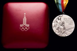 A Moscow 1980 Olympic Games silver second-place prize medal awarded for football,
in silver,