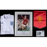 Memorabilia signed by four Manchester United club legends,