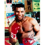 A Mike Tyson signed colour photograph,
an impressive 16 by 20in.