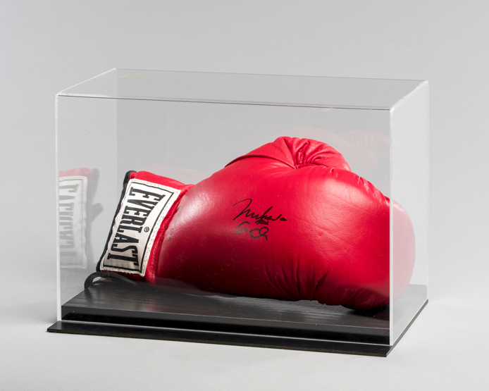 A Muhammad Ali signed boxing glove,