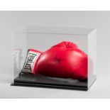 A Muhammad Ali signed boxing glove,