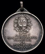 A rare hallmarked .800 silver 1930 World Cup medal,
Italian silver, 9.8gr.