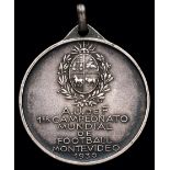 A rare hallmarked .800 silver 1930 World Cup medal,
Italian silver, 9.8gr.