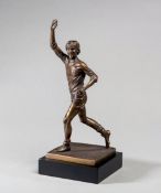 A bronze figurine of George Best titled "Best Moments",
by Emulate Studio, cast by Bronzart,