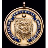 A Lancashire Football Combination medal awarded to a Rochdale player in season 1911-12,
in 9ct.