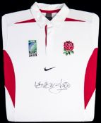 An England 2003 Rugby World Cup commemorative shirt signed by Lawrence Dallaglio,