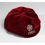 A red England v Wales international cap awarded to Tommy Crawshaw in 1904,