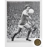 A collection of seven George Best-signed b&w photographic prints,