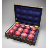A collection of a dozen match-used cricket balls collected by the New Zealand umpire Melville