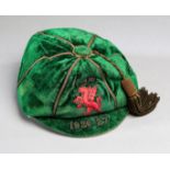A green Wales international debut cap awarded to Dan Lewis in season 1926-27,