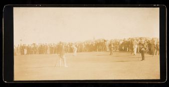 An original sepia-toned photograph published by A.