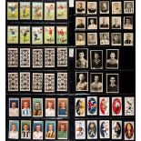 A large collection of football cigarette and trade cards,
sets displayed in five collector's albums,