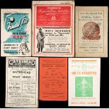 53 football programmes,