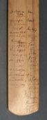 A child's-size cricket bat autographed by teams touring Ceylon circa 1934-1936,