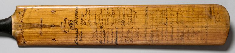 A fine autographed cricket bat signed by Test teams in the 1930s,