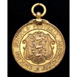 A silver-gilt English Schools Football Association medal awarded to John Talbut for the England v