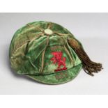 A green Wales international cap awarded in 1923,
inscribed F.A.W.