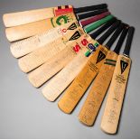 A collection of eight cricket bats signed by England and Australia Ashes teams,
for 1972, 1975,