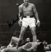 A Muhammad Ali signed b&w photograph,
a 6in.