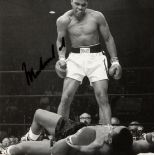A Muhammad Ali signed b&w photograph,
a 6in.