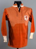 Ernie Curtis: a red Wales international jersey circa 1927-28,
by St Margaret's, long-sleeved,